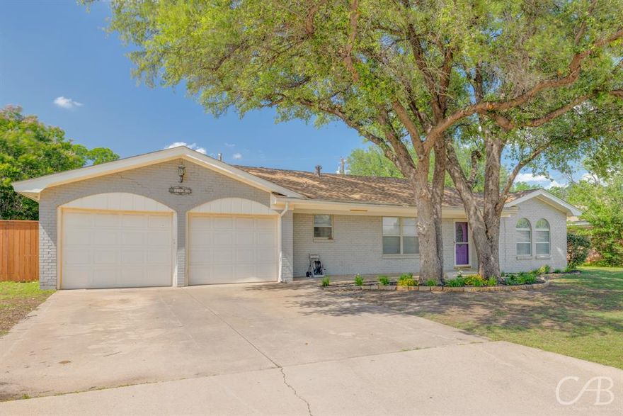 This 4 bedroom, 2 bath home is the perfect place for you and your family. As soon as you walk in, you'll notice the versatility of the living room; it can be used as a playroom or office space. The dining room has a great big window that looks out onto the front yard, adding tons of natural light and charm. In addition to this, there's also a family room with a wood burning fireplace and cozy sitting nook. All throughout the house are Hickory hardwood floors in neutral tones that give way to granite, marble and travertine countertops in both kitchen and bathrooms. Spend time with loved ones outdoors on your covered patio with deck- perfect for entertaining guests or just enjoying some fresh air together! There's plenty of storage space too; use it as an extra dog house or toy bin. To top it all off there’s also a sandbox for kids enjoyment in the private backyard. This home is bright, inviting & ready for its next owners- schedule your tour today before this one’s gone!