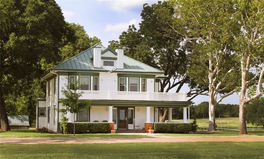 Run your Construction, Landscaping or Distribution Business from this meticulously restored turn of the last Century Colonial Styled Home.  This updated, impeccably maintained beauty reflects the elegance of the past with modern conveniences of today.  An ageless beveled-glass front door opens up to the solid-oak staircase peering down on a beautiful foyer wood floor.  Sliding pocket doors, and ornate tiger oak mantels are just a few of the rarities this home provides. Improvements include the kitchen, bathrooms, interior house vac, whirlpool tub & more, broad-stroking a canvas of modern upscale appliances with long-ago classics.  The wraparound porch and balcony overlook plush green open pastures and a tranquil 4-acre stocked pond. The pond has a 114 Ft aluminum bridge that makes a fabulous place to fish from.  Majestic 100-year-old Pecan trees embrace 30 acres creating a touch of beauty to nature's stunning picture. Infrastructure includes two insulated and heated metal buildings; building #1 40X75, 3K SF; Building #2 60X75, 4,500 SF both ideal for equipment storage, workshop or small manufacturing operation. Building #1 includes a well-constructed 1,000 SF mezzanine & full bathroom including a shower.  Both buildings include wrap-a-round lean-tos that amount to a combined total of 8,275 SF. A 1,000 SF Guest house provides additional housing for family, caretakers or perhaps a short term rental. A secured gate entrance controls access to the house & the buildings. In summation, this rare offering includes productive acreage, tax advantaged agricultural potential & business opportunities providing a well-diversified portfolio of income.