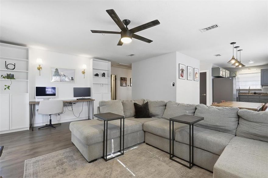 Step inside this beautifully updated ranch style home and enjoy the warm, inviting feel created by its thoughtful design and comfortable layout. The spacious living room sets the tone with luxury vinyl plank flooring, abundant natural light, decorative lighting, and a striking floor to ceiling brick wood burning fireplace that creates a true focal point for the home. It is an ideal space for both everyday relaxation and effortless entertaining.

The kitchen combines style and functionality with granite countertops, refreshed cabinetry, stainless appliances, and a cozy eat in dining area that looks out over the backyard. Both bedrooms are impressively large and each one features its own walk in closet, providing exceptional storage and flexibility that is uncommon at this price point.

The primary suite offers a peaceful retreat with an updated ensuite bath that includes modern tile, an upgraded vanity, and clean, contemporary finishes. The secondary bedroom is just as spacious and enjoys convenient access to a beautifully refreshed hall bath.

The backyard enhances the home even further with a large private lawn that is perfect for pets, gardening, or creating your ideal outdoor living space. The covered patio offers a comfortable spot for morning coffee, quiet evenings, or weekend gatherings. A storage building provides added convenience for tools, equipment, or extra belongings.

Situated on an interior lot in the quiet and well established Wedgwood neighborhood, the home offers quick access to major roads, shopping, dining, and schools. With its tasteful updates, practical floor plan, and generous outdoor space, this residence is truly move in ready and easy to love.