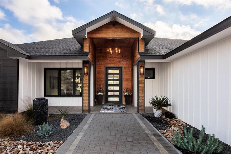 Exceptional custom built 2021 modern home on 130* acres in the Texas Hill Country, offering privacy, quality construction, and extensive improvements ready to welcome family gatherings and endeared company alike. This 3 bedroom, 3 bath  2,835 square feet residence features luxury design, expansive natural light, and elevated ceilings throughout.

Two fireplaces cascade upward, one in the main living area and another in the primary bedroom. The exquisite kitchen is fully equipped with premium KitchenAid appliances, granite countertops expanding over double islands, built in refrigerator, 48 inch dual fuel range, microwave drawer, wet bar with under counter refrigerator freezer, and under counter wine refrigerator.  Gatherings extend effortlessly outside into the outdoor kitchen with built-in propane grill and sink, and ample space. The outdoor patio at 848 sq ft is as grand as the interior with vaulted beamed ceilings, and views of wildlife surround. 

Water infrastructure is a dream, with a strong 850 ft well with water tested over 60 GPM (estimated at 100+ gpm).  Water softener and kitchen sink filtration system. 

Approximately 90% of the property is newly fenced, with improved access right off Hwy 87 via a crushed granite road, gates, and cattle guard. Improved grass and a sprinkler system are located within the fenced homesite. Barn newly constructed for livestock supplies and extra storage for ranching and bay for vehicles or tractor.  Ag exempt and current grazing lease make the taxes low to step into this dream home. 
Homeowner is professional home builder, and added more custom touches than can be expressed here, but eager to show and stand behind for the happy new homeowner.  Additional neighboring acreage available (76 acres). 15 minutes to Mason, 1 hr to Brownwood, 2 hours to Austin, 2 hours to San Antonio.