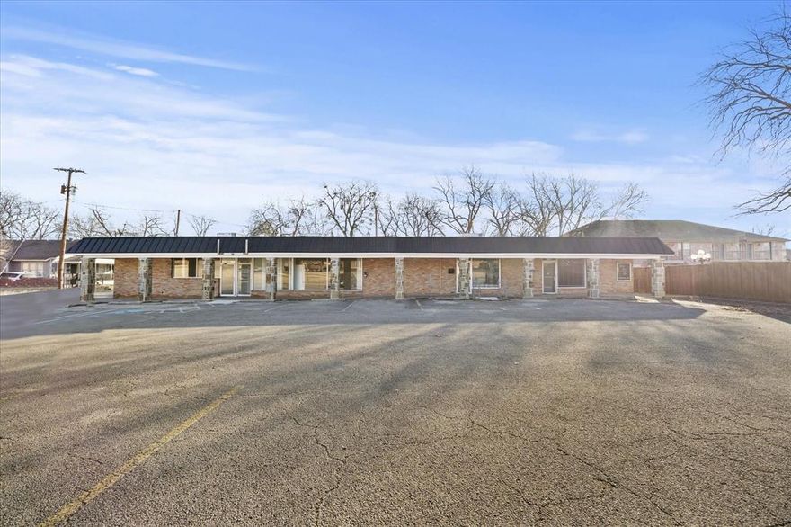 Imagine a place where your business doesn’t just exist, but truly belongs. Nestled just a stone’s throw from the energy of East Texas A&M University, this stunning brick plaza offers more than just square footage—it offers a chance to plant roots in the heart of a thriving community. From the moment you pull up, you’ll feel the difference. The expansive covered porch creates an instantly warm and inviting curb appeal, the kind of place where clients feel welcome before they even step through the door. And with a massive parking lot, you’ll never have to worry about your team or your customers circling the block; there’s plenty of room for everyone. Inside, the layout is designed for the way we actually work. Each of the four individual suites is thoughtfully partitioned to balance privacy and collaboration. You’ll find professional reception areas to greet your guests, quiet individual offices for deep focus, and large open spaces perfect for creative brainstorming or retail displays. Plus, with dedicated storage and private restroom facilities in each unit, everything you need is right at your fingertips. The real magic here? Versatility. You can move your business into one suite and lease out the others to create a steady stream of passive income, or expand your empire across the entire plaza. Whether you’re a growing startup, a local service provider, or a savvy investor, this is the kind of opportunity that doesn’t come around often. Your next chapter starts here. Come see how this beautiful space can help your vision come to life. Let’s get started today!