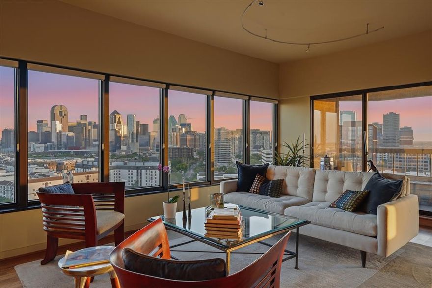 Elevated on the 16th floor of the iconic La Tour, this 3,126-square-foot double residence breaks the mold of standard high-rise living. By merging two units into one cohesive, L-shaped floor plan, designers Marco French and Ike Eisenhower created a space that feels more like a sprawling estate in the sky than a traditional condo. Perimeter walkways wrap around the home, ensuring that the 270+ degree views—stretching from the iconic Downtown skyline and Fair Park to North Dallas—are always the focal point.

The layout is intentionally split into two distinct wings to balance high-end entertaining with total privacy. Wing one is built for hosting, featuring an expansive living and dining area, full kitchen, guest suite, library, and a flexible executive office that easily converts into a third bedroom. On the other side, wing two is a dedicated retreat, anchored by a massive primary suite with a spa-inspired bathroom and dual ELFA closets. It also houses a refined media lounge equipped with a full bar, wine fridge, and ice machine—perfect for late-night movies or a quiet drink.  

The tech and perks here are just as impressive as the views. The home is outfitted with Grafik Eye lighting, a 12-speaker Sonos system, and Hunter Douglas shades. Rare for Uptown, the property includes four parking spaces, two storage units, and two board votes.

Living at La Tour means more than just a great view; it’s a full-service lifestyle. You’re steps away from the Katy Trail and the best dining in Uptown, but you also have a resort-style pool, a fully equipped gym with saunas, tennis and pickleball courts, and a private dog park right at home. With 24-hour concierge, valet, and a long-tenured staff handling everything from security to packages, the experience is entirely effortless. Whether you’re throwing a party against a backdrop of city lights or disappearing into your private wing, this is a level of space and security that’s hard to find anywhere else in the city.