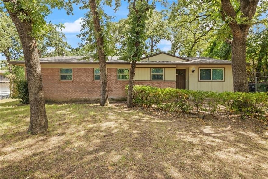 Welcome to 1900 Mimosa Drive, Arlington, TX 76012 - a charming, move-in-ready 3-bedroom, 2-bathroom home in highly sought-after North Arlington. Just 10 minutes from AT&T Stadium, the Entertainment District, and UTA, this 1,046 sq ft home offers the perfect mix of comfort and convenience. Inside, the kitchen features beautiful custom cabinets and tile countertops, while brand-new carpet in the bedrooms adds a fresh touch. Ceramic tile floors flow seamlessly through the living, dining, and hallway areas, creating a warm and inviting feel. Step outside to the oversized backyard, complete with mature trees and a storage shed—ideal for outdoor gatherings, gardening, or simply relaxing. Situated in a quiet neighborhood yet minutes from shopping, dining, and major highways, this home is perfectly positioned for both everyday living and weekend fun. Don’t miss your chance—schedule a showing today!