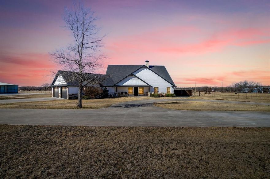 Welcome to your own private retreat on 60+ breathtaking acres, where wide-open space, comfort, and functionality come together beautifully. This thoughtfully designed main home features 3 bedrooms with 2 full baths and 2 half baths, including a convenient Jack-and-Jill bathroom connecting two of the bedrooms. The open-concept layout is anchored by a cozy wood-burning fireplace, creating the perfect gathering space for family and friends. Enjoy a versatile extra room that can serve as a workout space or home office, plus a dedicated laundry room with a utility sink, generous counter space, and abundant storage. An additional bonus room that offers even more flexibility for hobbies or extra storage. Step outside and take in stunning sunsets from the back porch while enjoying your own resort-style setup featuring a swimming pool, hot tub, and outdoor kitchen, ideal for entertaining or relaxing under the stars. There’s also a separate fenced area just for your dogs, so everyone can enjoy the outdoors comfortably. The property includes a spacious 3-car garage and a standout game room and entertainment area that adds an additional 748 square feet beyond the main living area. This space includes one of the half baths, along with a wet bar, covered hang-out area for parking or gatherings, and additional storage.  With room to roam, unmatched privacy, and every feature designed for both lifestyle and leisure, this 60+ acre property offers the perfect blend of country living and modern comfort.