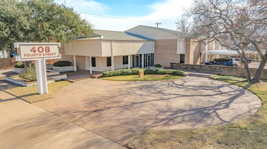 Prime Commercial Office Building for Sale in Graham, Texas! Strategically positioned within easy walking distance of Graham's iconic downtown square and the historic Young County Courthouse, this unique property offers exceptional visibility and accessibility in the heart of the community.
A designated historical marker on-site commemorates the founding of the Texas and Southwestern Cattle Raisers Association in February 1877, adding significant heritage value and appeal for buyers seeking a landmark investment.The front yard and primary office entrance feature a public park area, professionally maintained by the City of Graham at no cost to the owner—an outstanding perk that enhances curb appeal and reduces expenses.
This turnkey investment delivers immediate cash flow: The current owners occupy approximately half of the 5,500 sq ft main building and are committed to remaining as tenants for at least 2 years, with flexible, negotiable lease terms tailored to the new owner's preferences.
The main building, originally constructed as a bank, boasts a flexible floor plan ideal for diverse commercial or professional uses. It includes: 8 Large Private offices, 4 Bathrooms, Kitchenette, Work Room, Conference Room, 2 Large Storage Rooms, 2 Waiting and Reception areas, Intact Large Walk-in Safe (a rare preserved feature). An additional 1,716 sq.ft. outbuilding provides versatility with 3 separate spaces—two suitable for garages, storage, or workshops, and the third is ideal for an office, meeting room, or extra storage. Ample parking is available via a concreted lot, including 6 covered spaces under the carport plus additional open spots. Seize this rare opportunity to acquire a cash-flowing asset steeped in Texas ranching history. Contact us today for details and showings!