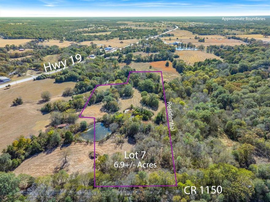 Discover the perfect blend of convenience, privacy, & East Texas charm with this rare 6.91± acre Residential Lot, located in the Emory city limits. Positioned off picturesque, tree-lined RS County Road 1150— just off SH-19, & under a mile south of downtown—this tract offers the ideal mix of country living and small town charm. Beautifully wooded with a striking mix of towering hardwoods and mature native trees, the property features rolling terrain, nice elevation changes, multiple building sites, a gorgeous pond, & a meandering creek (Glade Creek) that winds along the back of the land. Whether you envision a custom hilltop home, a secluded cabin, a hunting lodge, or a peaceful weekend retreat, the scenic views & natural setting provide a tranqul & peaceful backdrop for your plans.This property boasts excellent road frontage, sandy loam soil, cleared areas ready for improvement, & an existing AG Exemption to help keep taxes low. Utilities are nearby, & with an acceptable offer, the seller is willing to assist in bringing water and electric to the tract. Its close proximity to Emory, Lake Fork, and Lake Tawakoni adds even more value and recreational opportunity. Despite the private, tucked-away feel, you're just minutes from small-town conveniences—making it an incredible blend of seclusion & accessibility. With a little TLC & vision, this land could easily transform into your own personal escape & recreational haven. There is Flood Plain along either side of the creek, at the back of the property, where you will find towering trees, which offer great cover & surroundings for the local wildlife & white tail deer. Imagine having evening glass of wine, on your deck, overlooking the stunning pond, woods & creek, while taking in the beautiful Texas sunsets... your paradise awaits! With Seller Financing as an option, opportunities like this inside Emory city limits are few & far between…don’t this East Texas gem! Please contact Agent, to schedule your own private TOUR!