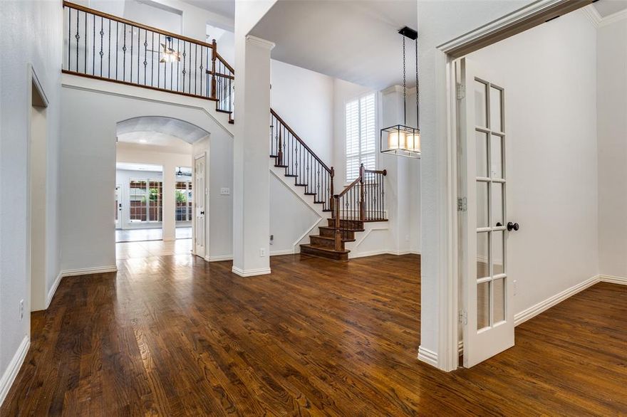 Built by Highland Homes & lovingly maintained by its original owner, this move-in ready home in The Park at Montgomery Farm combines thoughtful updates & a backyard designed to entertain, all while zoned to top-rated Allen ISD schools. Stone accents on the front of the home add to the welcoming curb appeal, then head inside to find a newly painted interior, tall ceilings, hardwood flooring, Plantation shutters & upgraded designer light fixtures & ceiling fans. The first-floor study is ideal for those working from home or to use it as a flexible 5th bedroom. The family room features a floor to ceiling tiled fireplace with modern mantel & large windows overlooking the backyard. The kitchen is both functional & stylish with granite counters, a center island, designer tile, gas cooktop & plenty of cabinets for abundant storage. Relax in the primary bedroom with a renovated ensuite featuring his & her vanities, granite counters, framed mirrors, tub & frameless shower. Upstairs you will find a generous game room plus dedicated media room for family movie nights. The upstairs features all wood floors with only the media room having carpet to optimize the acoustics. The real highlight is the backyard oasis — complete with a sparkling pool & spa remodeled in 2018 with new plaster & tiles, pool & patio flooring redone & more space added for a bar counter. A built-in grill & fridge sit under the covered pergola along with new landscaping & modern stepping stones on the side of the home. There is also a motorized fence gate with 2 new solar panels & batteries giving you complete privacy & maximizing backyard space. The garage features a vented counter space for cooking, ceiling storage rack & epoxy floors. New water heater, new sprinkler system control, new sod & re-stained board-on-board privacy fence. Located near shopping, dining & entertainment with easy access to Hwy 75, this is the home you've been waiting for! Shed & storage container near fence stays.