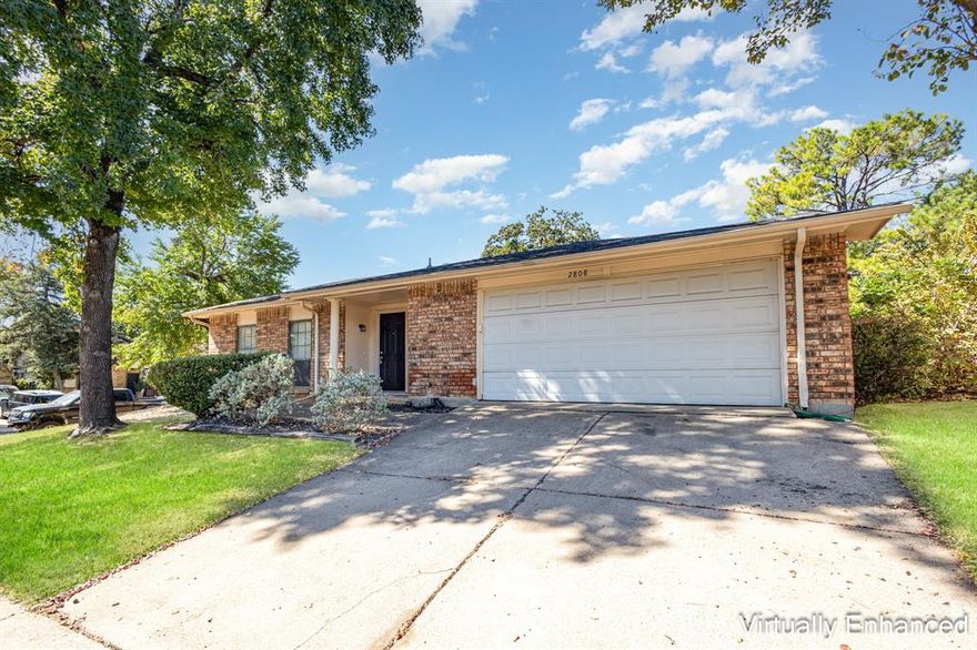 Welcome to 2808 Treeview Dr. Arlington. This four-bedroom, two-and-a-half-bathroom brick home sits on a corner lot in the desirable Rushmoor neighborhood. The thoughtful layout begins with a formal living and dining room combination featuring a dry bar and beautiful vinyl wood-look flooring. 

The heart of the home lies in the eat-in kitchen, where granite countertops, crisp white cabinets and a window looking into the back patio create a cook's paradise. The spacious breakfast area flows seamlessly into the family room, complete with a brick veneer fireplace. Access the private back patio through the sliding door, perfect for morning coffee or evening relaxation.

Location couldn't be better, with the home positioned within the  Dunn, Young, and Martin school districts. Residents will appreciate being just minutes from Interstate 20 and from W Pioneer Pkwy making commutes a breeze, while numerous parks provide endless recreational opportunities nearby such as Parks at Arlington Mall.

This well-positioned home combines practical living spaces with desirable neighborhood amenities, creating an ideal setting for comfortable living.