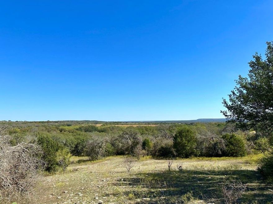 Amigos Ranch offers a combination of great Hunting and a productive Cattle Ranch, located on the waters of Mercers Creek, just South of Comanche, Texas, with frontage on State Highway 16, this ranch has a productive Coastal grass field and a winter wheat field in the rich bottom lands along Mercers Creek, with several ponds and other creeks to water the cattle and wildlife, along with three water wells and two ponds, and a concrete water storage tank on a working windmill. There is also a nice Metal barn on concrete with small living quarters inside, must see to appreciate, seller would consider owner finance.