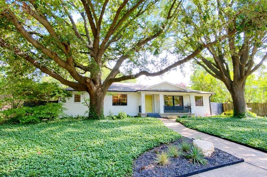 Discover a rare opportunity to own a luxury renovated home with a full guest house sitting on an expansive .4 acre lot. Majestic live oaks and other beautiful mature trees surround this property. Nestled on a serene cul-de-sac street in a quiet Dallas neighborhood, 5270 Ponderosa Circle offers a private retreat with the convenience of a prime location--just minutes from White Rock Lake, Lakewood, and Lower Greenville. Inside, its flexible floor plan offers an attached secondary residence, perfect for a mother-in-law suite or rental income. The primary residence features three bedrooms, two bathrooms, and a sprawling backyard. The secondary residence has its own separate kitchen, bathroom, bedroom, living, dining, laundry room, private entrance, and two fenced patios. Upgrades include new roof, gutters, HVAC, windows, interior & exterior paint, wood privacy fence surrounding property, sprinkler system, hardwood floors throughout, exotic marble & quartzite countertops & tile in kitchen and bathrooms, lighting, fixtures, and more. The property includes approximately 200 additional square feet not reflected in Dallas appraisal records; buyer to verify. Experience luxury design, spacious and secluded grounds, and potential income-producing use at 5270 Ponderosa Circle.