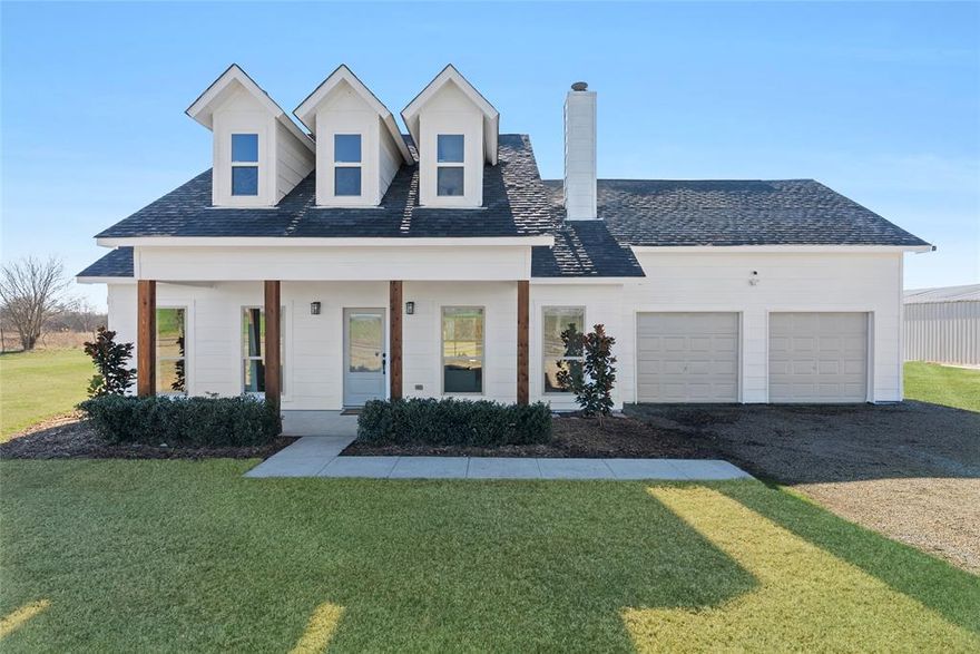 Open House Saturday, Feb. 21st, 1pm-3pm. SELLER IS OFFERING BUYER 10K TOWARDS RATE BUY DOWN OR CLOSING COSTS. Discover the perfect blend of country charm and modern updates in this beautifully remodeled home set on 5.13 acres in Gunter, TX, located outside the city limits yet close enough to everything you need. This inviting 4-bedroom, 2-bath residence features fresh interior and exterior paint, new windows, and laminate flooring throughout, creating a bright, cohesive, low-maintenance living space. The second story offers a private full bedroom with a walk-in closet along with an oversized game room that provides the perfect retreat for entertainment, hobbies, or extra living space. The kitchen shines with brand-new appliances and abundant natural light, flowing seamlessly into comfortable living and dining areas ideal for family gatherings. Step outside to enjoy peaceful countryside views from the covered front porch or relax and entertain on the spacious covered patio. For hobbyists, business owners, or anyone needing serious space, the property includes a 60' x 30' shop complete with electricity and a half bath, perfect for projects, storage, or future expansion. Animal lovers will appreciate the 20' x 20' barn with three stalls, offering flexibility for livestock, horses, or additional storage. With over 5 acres to call your own there is endless room for toys, adventures, and creating new family memories. This is the country lifestyle you have been dreaming of. See MLS# 21125204 if you would prefer smaller acreage with the home. Schedule your showing today!