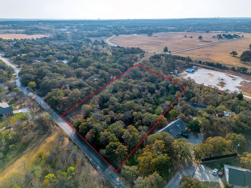 Embrace country living on this beautiful 2.35-acre wooded lot just outside Joshua, TX city limits. Mature trees blanket the property, offering natural shade, privacy, and a truly tranquil atmosphere. Whether you're planning to build, invest, or create a quiet retreat, this land provides endless opportunities.