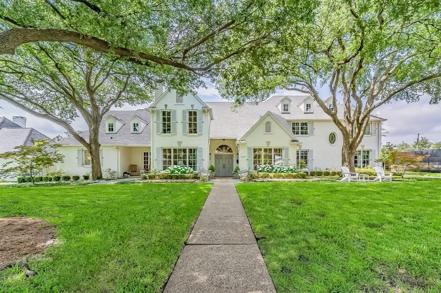 Charm, quality, and timeless elegance. Originally built in 1988, this estate has been thoughtfully reimagined and expanded by Barringer Homes,  surpassing new construction in quality and design. Tucked away in the heart of the prestigious private school corridor off Strait Lane, this custom 5 bedroom estate offers over 6,000 sq ft of living space and is the perfect blend of upscale elegance, family-friendly features, and resort-style amenities on a lush, spacious half acre lot. Designed with both everyday living and unforgettable entertaining in mind, this home showcases a thoughtfully curated layout with abundant natural light, hardwood flooring, designer lighting, and bright, open living spaces throughout. The backyard is a true retreat, featuring beautiful landscaping and outdoor lighting, mature trees, heated covered patio with a fireplace, kitchen, and gas lanterns, a sport court, playground, mosquito misting system, putting green, zip line, turf-lined yard, and ambient lighting to set the mood for outdoor gatherings. Inside, enjoy elevated living with standout amenities including a private first floor gym, elegant dining spaces, a first floor study - all tailored for comfort and sophistication.  Don’t miss the secret bonus rooms that could be used for additional play space, golf simulator, extra storage, additional bedrooms, or a panic room. The designer kitchen includes high end appliances, beautiful marble counter tops and backsplash, complete with an ice maker, drink drawers, and additional storage in the walk-in pantry and butler’s pantry. The spacious climate-controlled garage provides ample storage with custom built-in shelving. From its charming exterior to its gorgeous interior spaces, this home exudes refined livability. Whether you're hosting a crowd or enjoying a quiet evening by one of the multiple fireplaces, this gem was built to inspire and impress.  Move in now and enjoy the luxury others are still waiting to build.