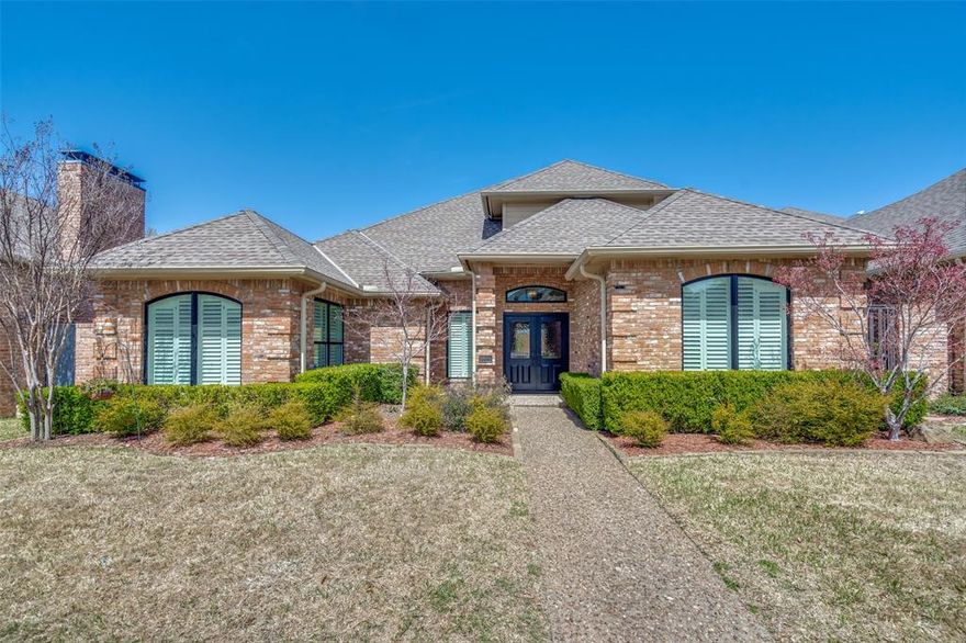 This sought after Prestonwood West home in far North Dallas has been completely renovated and includes countless upgrades and amenities. From the moment you step inside, you are flooded with natural light from the new expansive windows and open floor plan. You'll be impressed with the   10 ft ceilings, new custom stained wood beams at the Dining and Living areas and gas fireplace. The new wide plank wood floors are throughout the entire downstairs, including the Master Bedroom. The Master Bathroom has new custom cabinetry with his and her vanities, storage cabinet, free standing tub, spacious shower and new tile that runs through the newly appointed custom closet that includes a dresser and shoe wall. The Kitchen features new Kitchen Aid appliances, including a gas range and stainless steel hood. The countertops and island are Taj Mahal quartzite and the custom cabinetry includes under counter lighting and accent lighting in the upper glass cabinets. This home features 3 bedrooms, 2.5 bathrooms with the Master Bedroom downstairs and 2 bedrooms and shared bathroom upstairs. Master Bedroom is spacious and includes a separate sitting area with new windows and plantation shutters. There are 2 Living Areas, Dining Room and Bar area with built-in cabinet, white oak shelving and wine fridge. Beautiful newly appointed Powder Bath is also downstairs. New oak wood stairs and custom iron railings lead to a private upstairs with tons of storage and 2 bedrooms with new carpet. Shared bathroom features Taj Mahal countertops, double sinks, new lighting and new shower and tile throughout. Other amenities include all new windows, plantation shutters at front of the house, Laundry Room with new concrete tile and storage. 2-car garage includes storage closet. All new lighting and beautiful lighting fixtures are throughout the house. Beautiful sparkling pool with board-on-board fence were redone in 2019. Patio was just updated and the landscaping is beautiful with Japanese Maples.