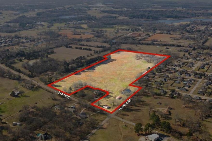 Check out this rare opportunity to own nearly 34 acres in the city limits with frontage on two high-traffic roads. This expansive property features three ponds, city utilities available, and multiple potential access points, offering excellent flexibility for future development. A prime investment opportunity with outstanding visibility and growth potential!