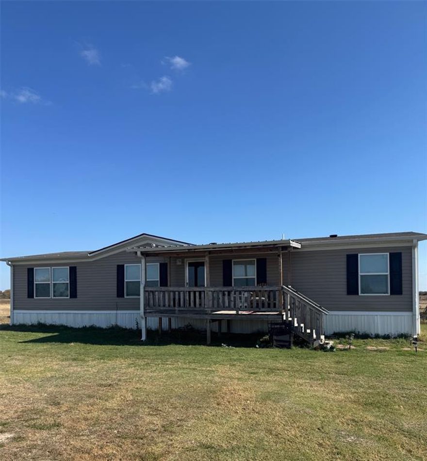 Welcome to your slice of peaceful country living on this charming 2.2-acre property just minutes from the shores of Lake Tawakoni. Located in the quiet countryside of Wills Point, this property offers the perfect balance of open space, seclusion, and convenience.
Set along an open county road, this acreage provides plenty of space to add to your dream home, bring your animals, or create the weekend retreat you’ve been envisioning. Enjoy open roads, wide-open skies, gorgeous Texas sunsets, and a lifestyle that feels far from the city hustle —yet keeps you close to everything you need. You’re just a short drive to Lake Tawakoni, known for fishing, boating, and outdoor adventure, making this a fantastic location for those who love the water and the outdoors. And with Downtown Wills Point or Terrell only 15 minutes away, you have quick access to shopping, dining, and everyday amenities. Whether you're looking to retreat away from the city and escape to the country, this 2.2-acre property provides the ideal blend of freedom, space, and convenience.  Great 4 bedroom 2 bath Clayton Home is calling for you to make this Home. 
Come experience country living in beautiful East Texas—your next chapter starts here.