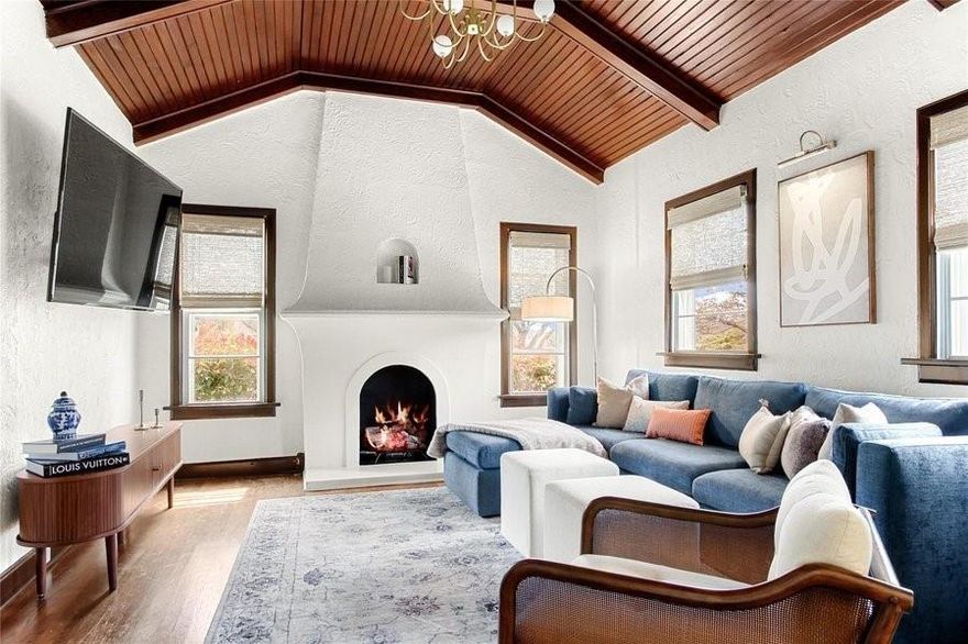 Beautifully restored 1928 Mediterranean-style bungalow in Fort Worth’s coveted Arlington Heights neighborhood. Brimming with original character and thoughtfully updated for modern living, this 3-bedroom, 2-bath home blends historic charm with contemporary comfort. The living room is anchored by a striking wooden barrel ceiling and an Old World-style fireplace. Original hardwood floors, arched walkways, and built-ins highlight the home’s timeless craftsmanship. Currently operating as a successful rental property leasing for $5,500 per month, the property is being sold fully furnished and move-in ready. Included are smart TVs, a fully equipped kitchen, designer furnishings from High Fashion Home, and luxurious Marriott-brand mattresses in all three bedrooms. Brand-new front-load washer and dryer and a stainless steel refrigerator are also included. Enjoy outdoor living with a charming covered front porch and a lush fenced backyard. An electric gate leads to a two-car garage, offering added privacy and convenience. Located just minutes from Camp Bowie, the Cultural District, Dickies Arena, Downtown and TCU, this home offers exceptional walk-ability, style, and value. Whether you're an investor seeking a turnkey rental or a buyer looking for a move-in ready luxury home, 4132 Pershing Avenue is a rare find. Schedule your private tour today and experience the charm for yourself.