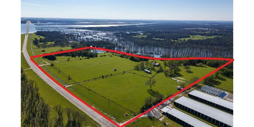 Extremely Rare 18+ acre lakefront parcel on Bois d'Arc Lake with extensive high-visibility frontage on FM 897—the key highway bridging the lake's northern and southern sides, featuring public boat ramps nearby.  This prime property currently has an agricultural valuation and offers direct lake access, sweeping shoreline, gently rolling terrain, and multiple build sites. Ideal for commercial ventures like retail space, convenience stores, a restaurant, hotel, wedding venue, or a boat dealership.  Optimal visibility for lake visitors and residents. High capacity waterline at property.
Enjoy lakefront living combined with conveniences—just minutes from Bonham, utilities, and amenities. Visit Bois d'Arc Lake today to see why Fannin County's newest recreational hotspot is attracting so much interest! Buyer and Buyer's Agent are to independently verfiy any and all information in order to conclude appropriate due diligence.  All lakefront use is governed by the North Texas Municipal Water District.  Buyer and Buyer's agent should reference their December 2023 published Shoreline Management Plan.  NOTE:  All property boundaries shown in photos are approximate and should be verified with available survey.
