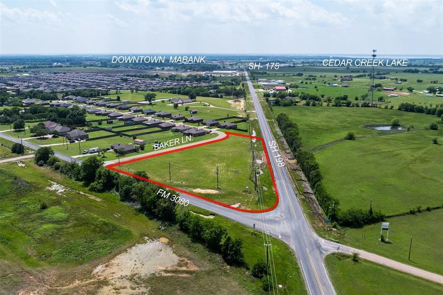 Prime Commercial Opportunity! This nearly 2-acre corner tract offers outstanding visibility in one of Mabank’s fastest-growing corridors. Ideally located at the intersection of a highly traveled State Highway and FM 3080, the property benefits from increasing traffic counts and excellent exposure. Surrounded by growth- including two established residential subdivisions adjacent and directly across the street- this location is perfectly positioned for continued success. Zoned commercial within the Mabank city limits, the site features level topography and on-site utilities, making it ready for development. Well suited for retail, a gas station-quick shop, or other service based businesses, this property provides the accessibility and visibility essential to thrive in a high growth area. An exceptional opportunity for investors and business owners looking to capitalize on location and expansion.