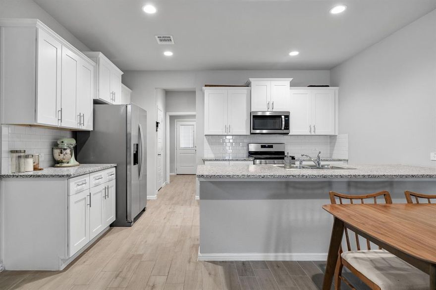 Step into a lifestyle of modern ease and refined comfort at this stunning DR Horton 2024 built residence, tucked away behind the private and gated community of The Overlook in Lake Worth Texas. From the moment you arrive, the pristine curb appeal of this like-new home signals a fresh start. With over 1600 square feet, the interior unfolds into a seamless open-concept design flows seamlessly across contemporary finishes, creating an inviting atmosphere that feels both sophisticated and warm.

The heart of the home is a chef-inspired kitchen that flows effortlessly into the living spaces, making it an ideal stage for hosting Friday night dinners or enjoying quiet morning coffees. With three spacious bedrooms and two modern bathrooms, the layout is thoughtfully curated to provide privacy and functionality for young professionals needing a home office or families looking for room to grow. Because it was completed just two years ago, every corner of this property boasts energy-efficient features and higher end materials like granite counter tops and a tankless water heater, offering the ultimate turnkey experience where the only thing left to do is unpack.

Beyond the secure gates of the community, the location is truly unbeatable. You are perfectly positioned in a central hub of Fort Worth, where a short drive brings you to the tranquil waters of Lake Worth and Eagle Mountain Lake for weekend adventures or the quick-access ramps of I-820 for a stress-free commute. Whether you are running errands at nearby grocery like Target or Walmart or exploring the vibrant local restaurant scene, everything you need is right at your fingertips. For the savvy investor, this property represents a rare hands-off opportunity in a high-demand pocket of North Texas, promising long-term value and low maintenance. This isn't just a house; it’s a modern sanctuary designed for the way you live today. New leather couch and entertainment center can stay with an acceptable offer.