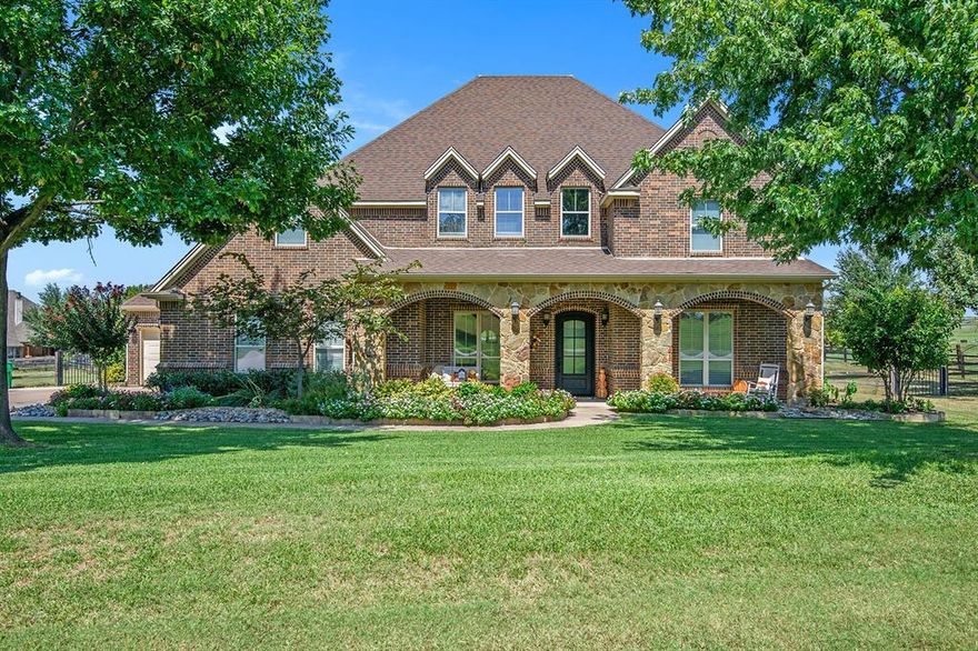 Welcome to this stunning Ft Worth home set on a spacious lot, blending comfort, functionality, and luxury inside and out. This home was recently valued at $900,000. Sellers have priced this home to sell fast! The home had a DOWN TO THE STUDS RENOVATION that was over $350,000 just under 4 years ago. You name it, it has been updated. The chef's kitchen with its spacious island, cabinets and pantry, the lower level was with wood look neutral colored tile, primary bathroom with a high end tiled shower, a spiral staircase from the upper balcony to the lower lever outdoor entertainment area and pool. The water well was updated, newer roof, WHOLE HOUSE GENERATOR was added so you never have to worry about power outages, too many updates to list.  The floorplan downstairs is open with the living room adjacent to the kitchen allowing for space when you have your large gatherings. The primary bedroom is also downstairs but is tucked away from the rest of the entertaining area it also has easy access to your 3 car garage. There is even a bonus room on the first floor that offers versatility for a game room or extra sitting space or office.  Upstairs, a built-in desk area provides an ideal office space with balcony access, and three additional bedrooms offer plenty of room for everyone—one featuring its own ensuite bath and connected bonus room or additional bedroom.
Step outside to enjoy a fully fenced backyard built for entertaining and relaxation. A covered patio with a seating area and outdoor kitchen overlooks a pristine pool, while stair access to the upper balcony provides an additional outdoor escape. With plenty of green space, there’s room for play, pets, or gardening. Nestled in a sought-after community, this home is close to local parks, shopping, dining, and schools, while offering easy access to major highways for a smooth commute. Combining generous space, thoughtful design, and resort-style outdoor living, this property is truly a one-of-a-kind find in Ft Worth.