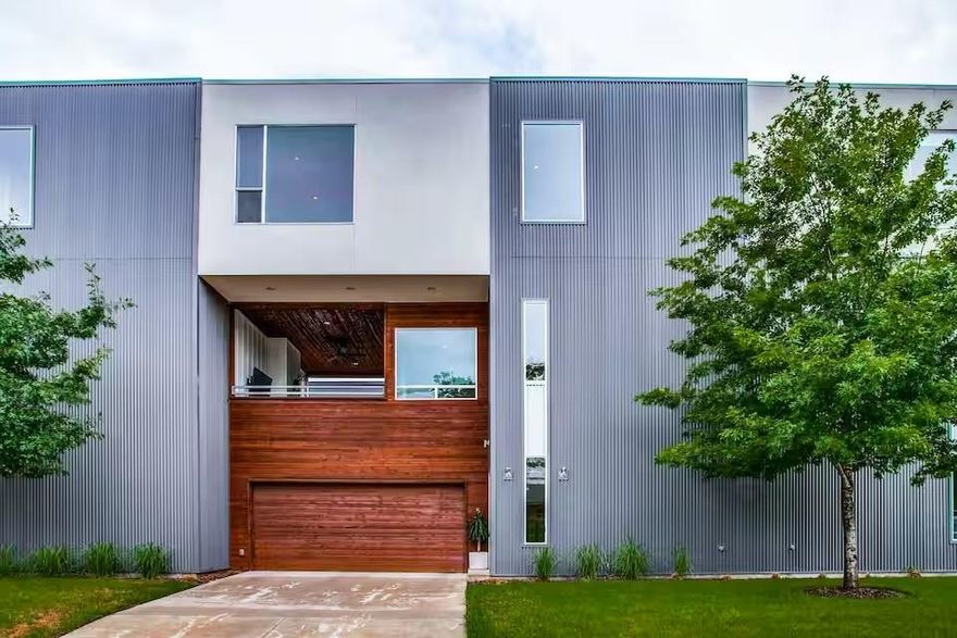 Thoughtfully designed and beautifully finished, this 2,347-square-foot condominium in East Dallas offers a refined take on modern urban living.The chef-inspired kitchen features striking quartz countertops, stainless steel appliances, and generous storage—perfect for hosting or everyday living. An open-concept layout flows seamlessly into the dining and living areas, where soaring ceilings amplify the space and natural light pours in.

Step outside to a private second-floor terrace, your own hidden retreat complete with a fireplace—ideal for cozy nights, entertaining, or relaxed al fresco dinners. Two spacious bedrooms and two-and-a-half baths offer both comfort and style, while the light-filled primary suite impresses with a large walk-in closet, a dedicated study, and serene treetop views.

Expansive windows flood the home with sunlight, highlighting polished concrete and hardwood floors throughout. Tucked among lush greenery yet just minutes from everything Dallas has to offer, this home is the perfect blend of modern design, privacy, and city convenience. Investors DREAM Airbnb - currently serves as one! With World Cup coming to Dallas this could be an amazing opportunity.