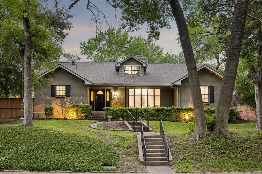 Amazing mid-century Ranch in popular Lochwood sits upon an elevated corner lot, facing a gorgeous creek and greenbelt. Classic architectural details including a welcoming front porch and gabled dormer make for inviting curb appeal.  Upon entry, one will find hardwood floors and a double-sided gas fireplace along with a large picture window that gives views of the greenbelt. Kitchen updated in recent years with newer backsplash, appliances, & leathered granite countertops. The cozy sunroom provides a 3rd living space or play space with excellent pool views! Primary ensuite is downstairs with the other 3 bedrooms on the 2nd level, 2 of which share an updated Jack N Jill bathroom. The 4th bedroom is a built-out space on the 2nd level & has its own full ensuite bath, could also be used as a desired flex space. Tall wooden fence offers great privacy at the pool, which was resurfaced in 2024. The property also offers additional yard space with mature trees found adjacent to the pool area.  Other updates include two new 2023 HVAC systems, renovated guest bathroom, added insulation, & all metal exterior railings painted 2026. Nestled amongst the mature trees, come visit this classic beauty and discover the charm of Lochwood, located 5 mins from White Rock Lake, 2 mins from Lochwood Park, & a sundry of local shops & eateries in close proximity. Walking distance to Lochwood Park & the library!