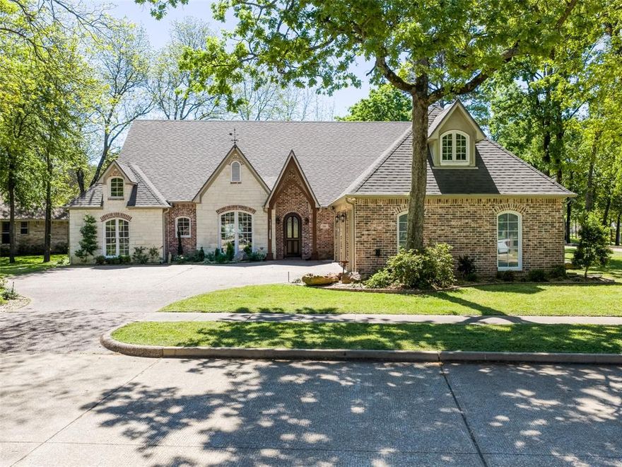 Discover the comfort of this exquisite four bedroom, three bath home nestled in the beautiful Eagles Bluff subdivision. You will step inside an updated, versatile floor plan designed to accommodate a variety of lifestyles and excellent for entertaining. The heart of the home is the spacious living area, leading to the expansive breakfast room that can also be a second living area, drenched in natural light and a seamless flow through kitchen to formal dining, or formal living area. So many living area options. Huge breakfast room area could be a second living area. The gourmet kitchen boasts sleek granite countertops, breakfast bar, ample cabinetry, refrigerator, wine refrigerator, and instant hot water. Updated primary suite offers large shower and walk in closet. The property's exterior is equally impressive with updated lush landscaping and sprinkler system that enhances it's curb appeal and offers a peaceful outdoor setting. The backyard is a haven for relaxation, featuring a patio area perfect for morning coffees or evening sunsets, along with a Plunge pool, which is for relaxation, rehabilitation, or cooling off during the hot summer days. Addl updates include paint, flooring, appliances, ceiling fans, wood burning stove, generator, HVAC, roof and more. The spacious three garage is a man's haven, featuring insulated garage doors, storage and high end RaceDeck flooring for floor protection. Eagles Bluff Country Club area at Lake Palestine is a top golfing community offering a new Golf Performance Center. The community also offers winding sidewalks for outdoor exercise, an active Club with excellent dining, events and music, a golf pro shop, tennis, pickleball, swimming pool, workout facility and more.