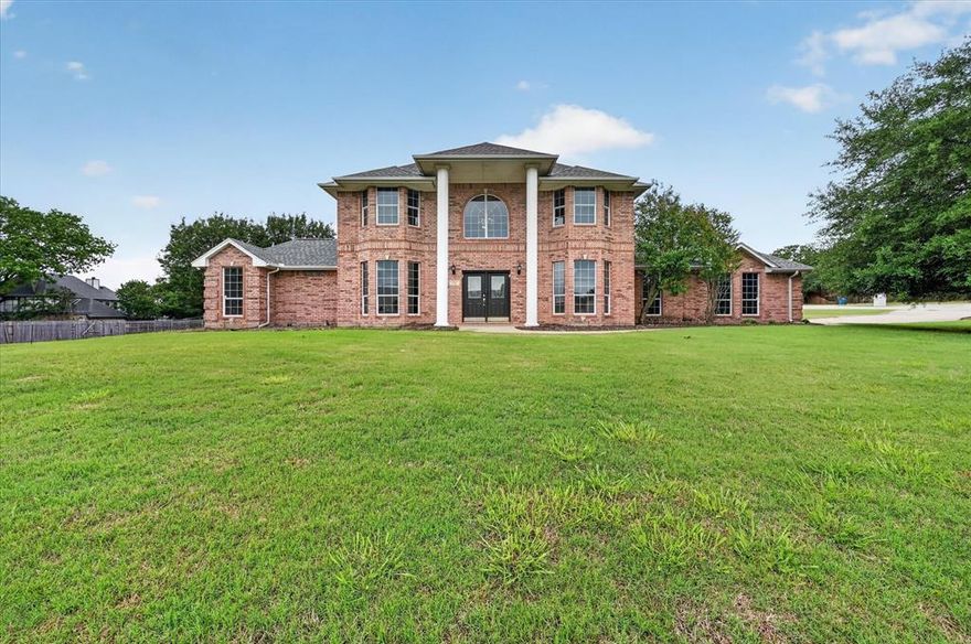 Set within one of Burleson’s most secluded and serene communities, this stunning colonial-style estate offers the perfect balance of privacy, space, and everyday comfort. Situated on 1.23 acres with no city taxes, this 3,791 sq. ft. home delivers a true escape from the noise while still being minutes from everything you need. Located in The Summit, a quiet neighborhood with a single entry point, you’ll immediately notice the difference, less traffic, more peace, and a strong sense of community. Wide open skies and the calm of country living set the tone from the moment you arrive.

Inside, the home is thoughtfully designed for function and flexibility. With 4 spacious bedrooms and 4 full bathrooms, including a private ensuite ideal for guests or multigenerational living, there’s room for everyone. The oversized primary suite is a true retreat, featuring direct access to the backyard patio and pool perfect for slow mornings or unwinding at the end of the day.

A dedicated home office offers a quiet workspace, while the upstairs game room is ideal for entertaining or relaxing. The kitchen and bathrooms have been refreshed with painted cabinetry and updated hardware, creating a clean, modern feel while maintaining timeless character.

Step outside to your own private retreat with a fully fenced backyard, gated pool, and expansive patio perfect for hosting or relaxing. The 24x40 workshop is a standout, complete with 15-foot ceilings and dual 10x10 roll-up doors ideal for RV storage, a gym, hobbies, or workspace.

Additional upgrades include a Rheem 80 gallon smart water heater, Ring security system, radiant barrier, solar attic vent, and a 3 car garage. Ideally located near the Burleson and Mansfield line, this home offers the best of both areas while still feeling like a private escape.

This is more than a home, it’s space, freedom, and a lifestyle designed to be enjoyed.