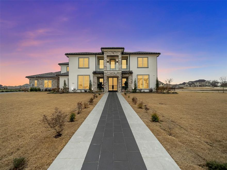 This stunning Parker property boasts a spacious and thoughtfully designed layout, perfect for discerning buyers seeking luxury and comfort. It features five generously sized bedrooms, each with its own bathroom, ensuring both privacy and convenience. The heart of the home is an open-concept living area that seamlessly transitions to outdoor dining and living spaces, making it ideal for hosting gatherings or simply relaxing in the Texas sunshine. A beautiful Imported Custom tile foyer leads to oversized living and dining rooms, while the kitchen, equipped with a center island and butler's pantry, opens to a cozy breakfast room. The den, adorned with French doors, overlooks the backyard, enhancing the connection to nature. The luxurious primary suite includes a custom closet and a private balcony with views of the yard, complemented by a second master suite and three additional spacious bedrooms along with a playroom on the second floor. The backyard is an entertainer's dream, featuring an outdoor kitchen and covered patio, while practical amenities include an attached four-car garage, an elevator, a Dirty kitchen, and three outdoor balconies. Situated on a 1.4-acre lot, this  custom-built home offers an impressive 7,436 square feet of living space, making it a remarkable find for anyone looking for elegance and comfort.