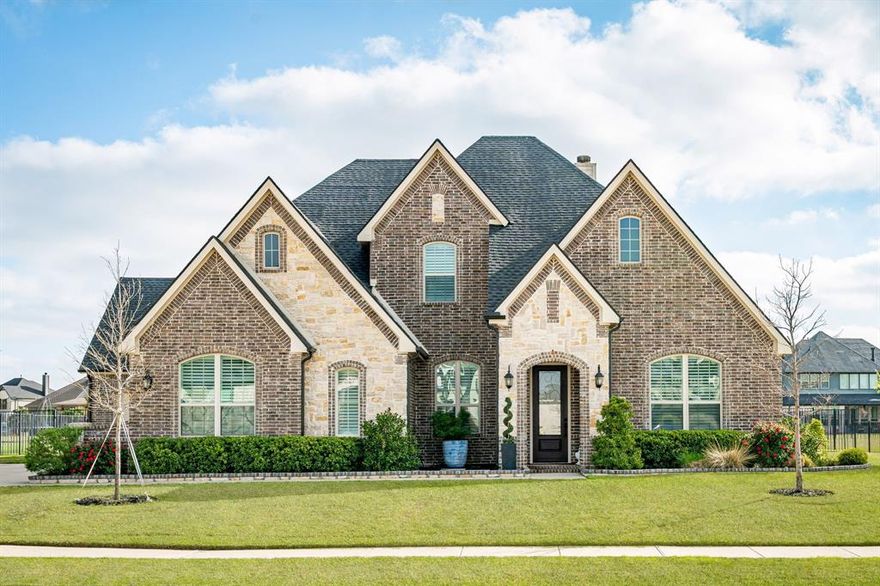 Step into the airy, open entryway of this beautifully built custom home! Grand two-story foyer with a sweeping staircase and wrought iron detail. Main living areas feature hardwood floors, crown molding, and plantation shutters for a refined feel. Open living area with several windows allows plenty of light with clear views of the expansive back yard. Chef’s kitchen is bright and boasts an abundance of custom cabinetry, granite countertops, double ovens, and a gas cooktop. Separate dining room is perfect for large family gatherings.

Primary suite is tucked away on the first floor for maximum privacy. An additional first-floor bedroom and full bath work perfectly for a guest suite or home office. Upstairs features a massive game room, dedicated study, and two bedrooms joined by a functional Jack-and-Jill bath. Spacious, pool-sized, half-acre lot with 6-foot wrought iron fencing. Split 3-car garage, newer roof with transferable warranty, and updated irrigation system.

Exemplary Gunter ISD, within walking distance to the new elementary school. Signature golf course community with the option to join the 6,000 sq. ft. clubhouse, fitness center, pool, tennis courts, and restaurant.