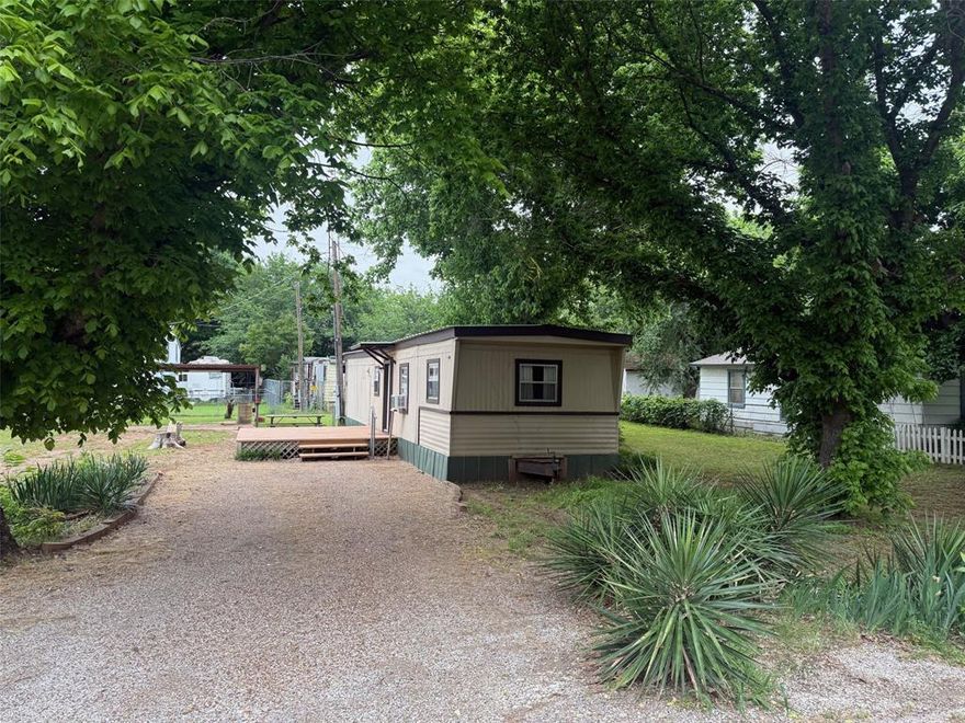 Located out of city limits this property is in a quiet neighborhood with boat ramps to access Granbury Lake for some awesome fishing!  With two lots and a dbl driveway there is plenty of room for parking a boat or travel trailer.  Just minutes away from larger ramps for larger boats! Could be a permanent home or a weekend retreat! 
Property to be sold AS IS CASH ONLY.  No survey Buyer will need to purchase if desired.