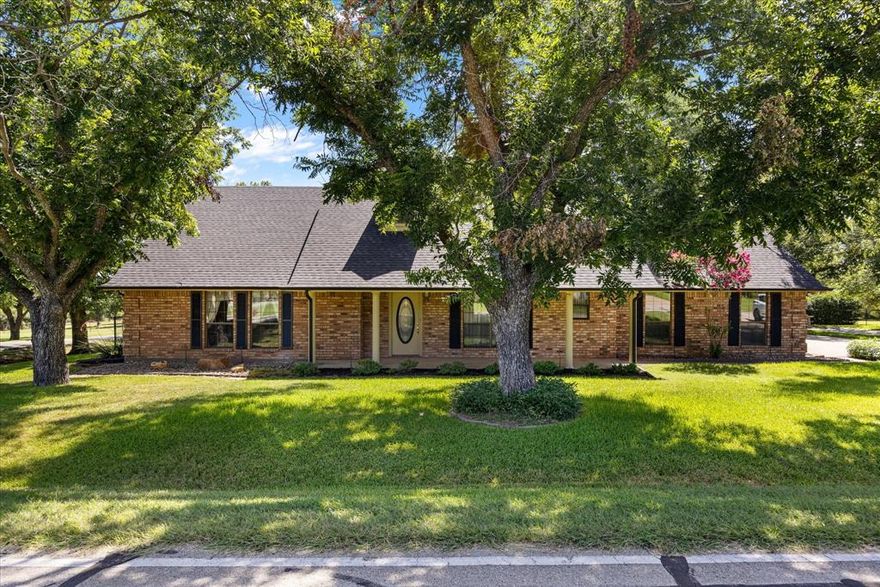Welcome to this charming brick home nestled in Pecan Plantation. This well maintained residence features classic curb appeal with mature trees and a welcoming front porch. Located on a generously sized lot. Don't miss your opportunity to own this delightful piece of residential comfort! Perfect for families or anyone seeking a peaceful retreat at a great value!
