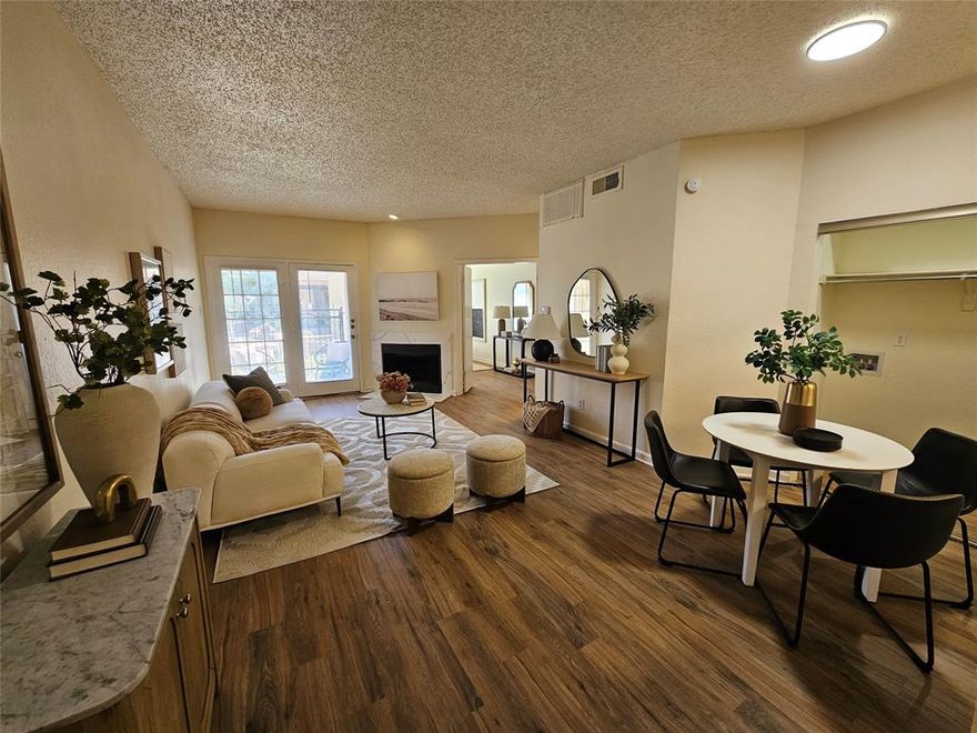 Discover an incredible opportunity to own in one of Dallas’ most convenient and highly sought-after areas! This first-floor 1-bedroom, 1-bath condo offers the perfect blend of comfort, style, and value ideal for both homeowners and investors.

This home features an open floor plan with a bright, airy feel, creating a welcoming and spacious environment. The unit includes stackable washer and dryer connections for added convenience, and water and sewer are included in the HOA providing extra value and ease of living.

Step inside to find fresh updates throughout, including new vinyl plank flooring, modern cabinetry, and updated countertops. The galley-style kitchen offers ample prep space, while the wood-burning fireplace adds warmth and character to the living area.

Enjoy the added bonus of a private back patio with direct access to the community pool, making it easy to relax and unwind right outside your door.

Located in a gated community, this property offers both security and convenience, with quick access to the Dallas North Tollway and IH-635, placing shopping, dining, and entertainment just minutes away.

Whether you're looking for a place to call home or a smart investment in a prime location, this condo is a fantastic value you don’t want to miss!