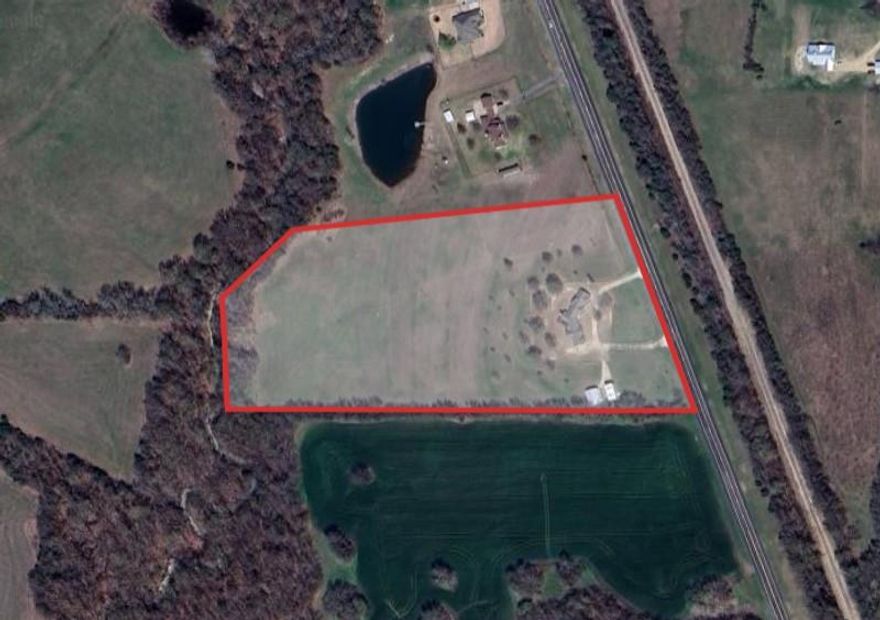 This exceptional 12.6-acre property located at 5393 Highway 5 offers a premier investment opportunity directly adjacent to the Van Alstyne city limits. Positioning is key, and with approximately 596 feet of high-visibility road frontage along State Highway 5, this tract captures significant traffic counts in a rapidly growing corridor. Currently zoned agriculture with a valuable tax exemption in place, the land features a residence and two outbuildings situated on approximately one acre, providing immediate utility or potential rental income while you plan for future development. Because the property sits just outside city limits, it offers immense flexibility for end-users and investors alike; potential uses are nearly endless, ranging from self-storage and warehousing to office parks or retail centers. Whether you are looking to capitalize on the area’s expansion or secure a strategic site for your own business, this property combines location, versatility, and agricultural tax benefits into one outstanding package