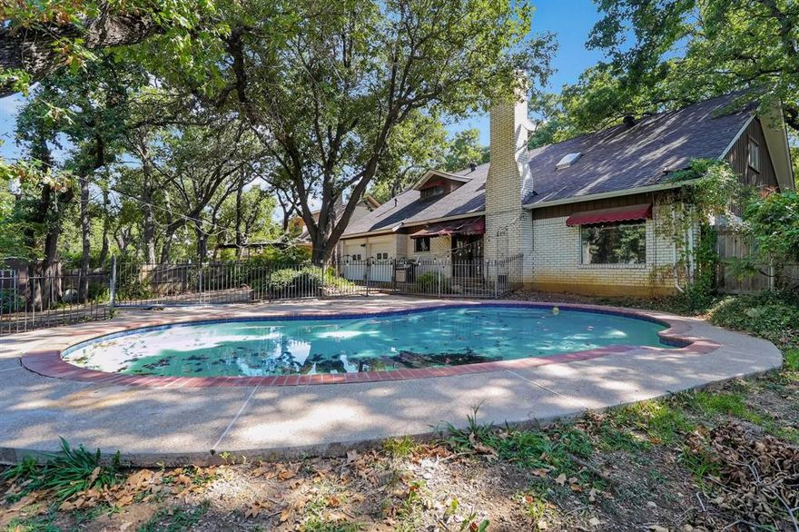 PRICED TO SELL!! Motivated Sellers. Mid Century Modern located in Woodland West, 76013. This is a very unique home, 3 Bedrooms, all with connecting full bathrooms. 3 Living Areas and a large picture window overlooking a beautiful gunite pool. Lots of closets and storage. Large backyard, perfect for outdoor living and entertaining.