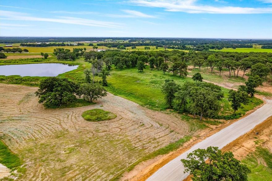 Beautiful ±70-acre tract located just minutes from Lake Kiowa. This property offers a mix of open pasture and gently rolling terrain with stunning views overlooking a natural pond—ideal for a custom homesite. Utilities are already on-site, and the gated entrance provides both privacy and convenience. Whether you’re looking to build a homestead, run livestock, or invest in land, this property offers endless potential. Enjoy a low tax rate and easy access to FM 902.—bring your vision and make it your own.