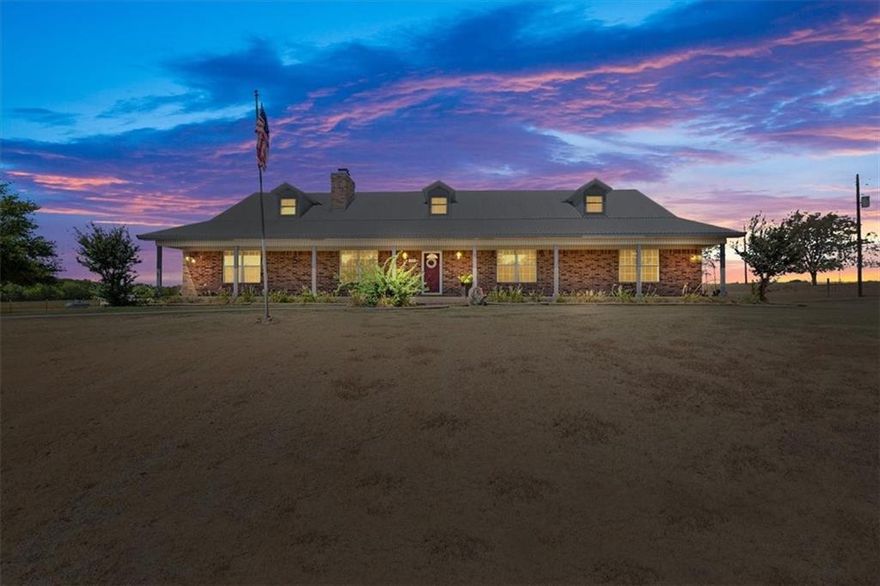 This Texas custom beauty sits on 237+ acres - with mineral rights - in the heart of Hill county.  Easy commute to DFW, Hillsboro, or Waco makes this a prime location for your homestead, cattle operation, and countless reasons to fall in love.  Built with love in 1995 from the ground up, and over 3700 square feet, this gorgeous home features four large bedrooms and three full baths.  The open kitchen has bar seating, a large dining area, and still more room for additional seating for a breakfast area and/or card/game table.  The beautiful entry is an immediate welcome as you step inside an over-sized, vaulted living room with a wood-burning fireplace and built-in shelves.  The o ffice has multiple cabinets for unlimited storage and so many opportunities to get organized.  Isolated, primary bedroom suite has an abundance of room for all your favorite furniture and a large bathroom with dual vanities and ample closet space.  All other bedrooms are on the opposite end of the home, with a floor plan that gives everyone their own space.  Outside, you'll find a wonderful garage/workshop, covered porches galore, multiple other barns for livestock and/or equipment, a 12-acre pecan orchard, SEVEN stock tanks, unbelievable highway road frontage, and lush pasture land for hay that goes on for days!