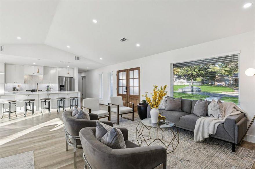 Experience refined North Dallas living in this beautifully renewed residence, set in a highly sought-after location south of LBJ with exceptional access to premier dining, shopping, and major thoroughfares. Fully renovated from top to bottom, this 3-bedroom home offers an inviting open-concept layout with redesigned airflow thanks to rerouted vents and thoughtful improvements throughout. The spacious living area features abundant natural light and seamless flow into the dining space and the reimagined kitchen, now boasting updated cabinetry, modern finishes, and an expanded layout ideal for everyday comfort or hosting guests. Each bedroom offers its own access to a dedicated bath, creating a rare level of convenience that enhances privacy and functionality. With a total of 3 full baths—including one newly added during the renovation—the home provides versatility for varied living arrangements. The oversized den provides an additional gathering area with easy access to the backyard, where a newly installed concrete driveway and remote-controlled rear gate offer enhanced security and convenience. Outside, mature trees frame the property, adding shade and character. The gated backyard, accessible from the alley, includes ample parking options thanks to the updated drive and garage configuration. Built in 1967 and thoughtfully modernized while preserving its charm, this 2,019-square-foot home offers a move-in-ready opportunity in an area known for its unbeatable proximity to key Dallas destinations, parks, and everyday essentials. With every major detail refreshed and redesigned, this property delivers a polished, contemporary feel in a location that continues to be one of Dallas’s most desirable. The extensive renovation ensures long-term comfort, improved efficiency, and a stylish environment suited for those seeking quality craftsmanship and a thoughtfully updated living experience.