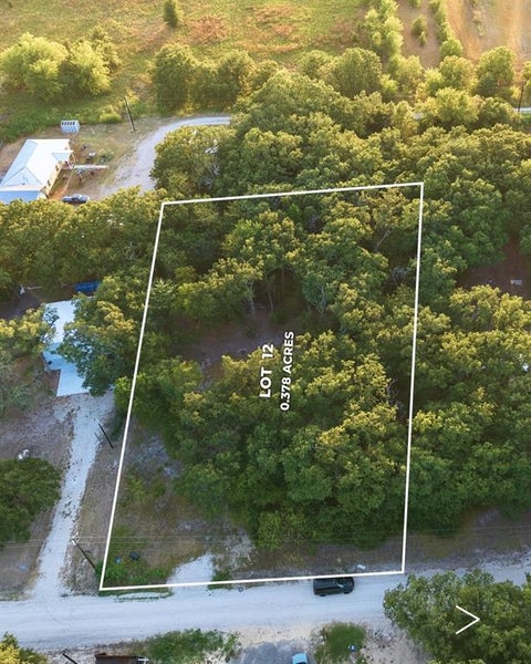 Photo of 305 Sandy Lynn, West Tawakoni, TX 75474 (MLS # 21367887)