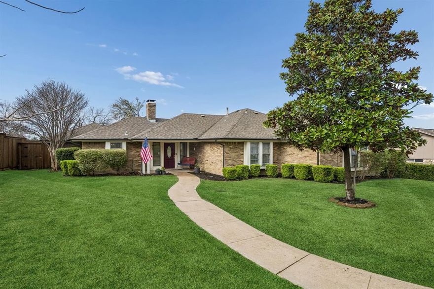 Nestled in an established neighborhood just minutes from the shores of Lake Ray Hubbard, this beautifully maintained 4-bedroom, 3-bathroom home offers space, comfort, and a prime location within Rockwall Independent School District. Surrounded by mature trees and featuring a large front yard, the home provides both curb appeal and a welcoming sense of privacy. Inside, you’ll find a light and bright interior filled with natural light. Tile and luxury vinyl plank wood flooring flow throughout the home, complementing the spacious living room with vaulted ceilings and a cozy fireplace, perfect for gathering and relaxing. The kitchen is generously sized and features an eat-in dining area, ideal for everyday meals and entertaining.
The primary suite offers a peaceful retreat with a versatile sitting area that is currently set up as a work-from-home space. Walk in closet. The ensuite bathroom includes dual sinks and a brand-new walk-in shower for a fresh, modern feel. Secondary bedrooms are generously sized and thoughtfully arranged. One bedroom is conveniently connected to a full bathroom, while the other two share a Jack-and-Jill style bathroom, each with its own private sink and vanity for added functionality. Ample storage throughout the home ensures everything has its place. Step outside to enjoy the outdoor patio, perfect for relaxing evenings or hosting friends and family beneath the shade of mature trees. Ideally located just minutes from Reinhardt Elementary School, Utley Middle School, and Rockwall High School, this home also offers convenient access to shopping, dining, and major commuting routes. A wonderful opportunity to enjoy comfort, space, and a fantastic Rockwall location.