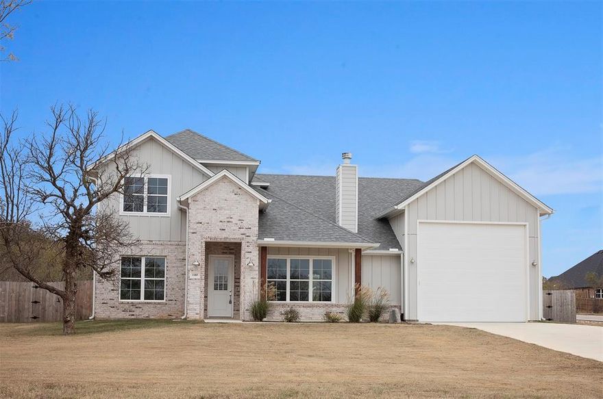 Discover a hidden gem at beautiful Possum Kingdom Lake—where lake living meets everyday convenience. Tucked inside a private, gated community, this beach-themed beauty lets you enjoy the serenity of the lake while staying just a short drive from Graham, Mineral Wells, and the Metroplex. Truly the best of both worlds.

This spacious home features a master suite and additional bedroom on the main level, plus two oversized bedrooms upstairs—each with its own private bath. The gourmet kitchen opens to the living area for easy entertaining and relaxed gatherings. A huge bonus: an oversized garage with 16-foot ceilings—perfect for storing a boat, RV, or lake toys.

The HOA provides all the perks: a sparkling community pool, clubhouse, and playground. Even better—you’ll enjoy free access to Tranquility Cove, offering a private boat ramp, boat slips, parking, and RV space for out-of-town guests.

Whether you’re seeking a peaceful full-time residence, a weekend getaway, or a smart investment, this property checks every box. Located minutes from Rocker B Baseball, it’s also an ideal vacation rental for visiting families. Lake life, convenience, and opportunity all in one.