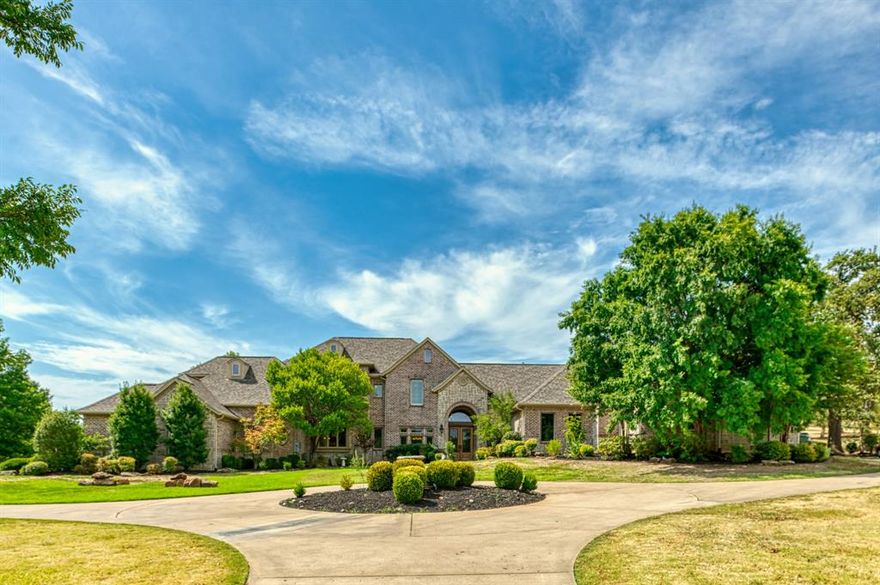 This majestic home on 1.4 acres in desirable Keller ISD has just been masterfully updated with countless upgrades. Pella premium windows, tankless water heaters, new primary bath, flooring, roof, 4 HVAC units, and much more. The distinctive design offers the flexibility of two homes in one. A multi-generational home, VRBO, professional home office, or anything the new owners can imagine! The sweeping drive leads to separate entrances, with independent oversize garages. The main home features a kitchen with Sub-Zero refrigerator, double convection ovens, gas cooktop, island & walk-in-pantry, and a primary suite with deep soaking tub, separate shower & huge custom walk-in closet. Upstairs offers 4 bedrooms, 2 full baths, 2 game rooms & bonus room. Second home offers a living room, full eat-in kitchen, 2 bedrooms, 2 baths, laundry room & 2 studies. The huge, shaded lot would welcome a pool or outdoor oasis. Minutes to Southlake dining & shopping, and just 5 minutes from Vaquero Golf Club.