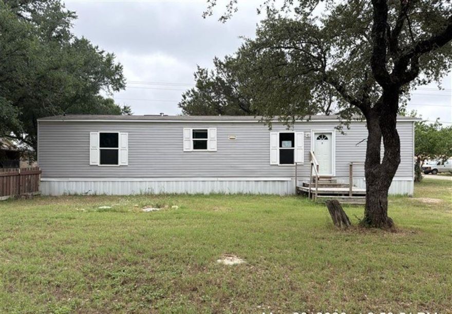 HUD case number 513-230860.  SOLD AS IS with all faults.  Perfect opportunity for anyone who wants to own a little bit of land with simple living near Lake Grapevine.  With 2 bedroom and 2 full baths this would make a great place for a first-time homebuyer to settle in for a while.  Enjoy a Texas Sunset from your backyard.  Easy drives to dining, shopping and nearby highways.  Spend weekends walking the square in Granbury browsing the many antique stores and gift shops, and take a rest on one of the quaint eateries.  Take a look at the HOA website and take a look at the amenities available for very reasonable dues, including 3 community boat ramps.