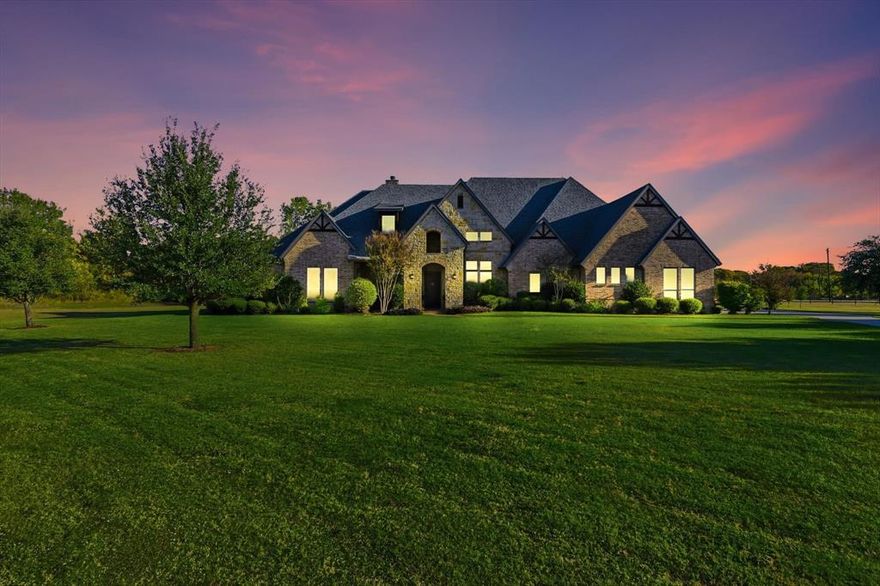 Relocation Home** Experience luxury living in this stunning Cleve Adamson custom home, perfectly set on 3 beautiful acres in the highly desirable Lovejoy ISD. This 5-bedroom, 4.5-bath residence blends elegance, comfort, and practicality in every detail. Inside, rich hardwood floors flow through an open-concept design connecting the gourmet kitchen and spacious family room—ideal for entertaining or relaxing.

The split-bedroom layout ensures privacy, with a luxurious primary suite featuring dual vanities, His and Hers closets—including a metal-lined safe room in His—and spa-inspired finishes. A large game room offers space for a media setup and game tables, while walk-up attic stairs lead to a massive 25x42 floored attic ready for finishing or ample storage.

A 3-car garage provides generous room for vehicles and equipment. Combining custom craftsmanship, top-rated schools, and wide-open space, this exceptional home offers the perfect balance of luxury and lifestyle—complete with a brand-new roof!