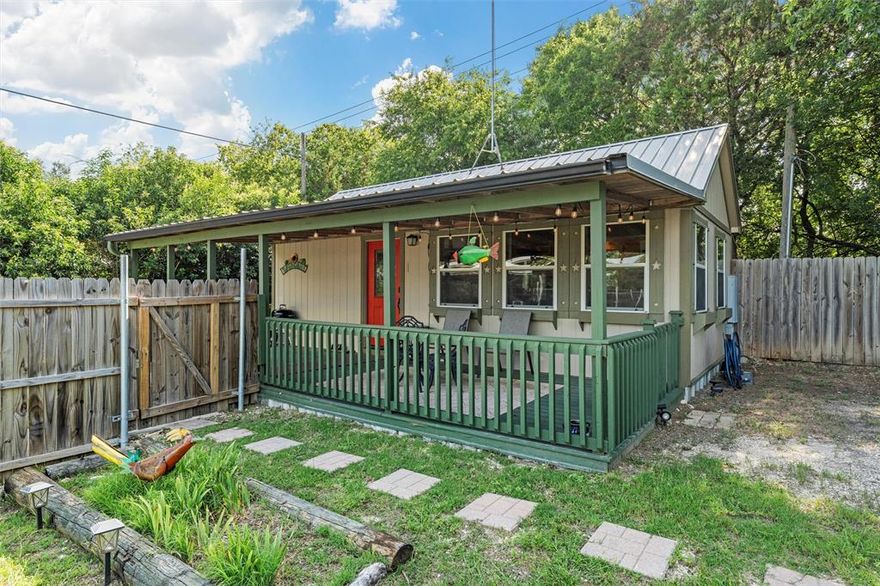 A big, little Lake Whitney opportunity! 

Welcome to 191 CR 1743 Clifton, TX 76634; a charming 1 bed, 1 bath, 392 sqft cottage that's just about a 5 minute walk to Lake Whitney! Nestled in Laguna Park, you will enjoy the freedoms of no restrictions in a thoughtfully updated tiny home minutes from nearby stores, beloved local restaurants, parks and boat ramps. Enjoy your own vacation oasis with two nearby parks - Soldiers Bluff & Loflers Bend - for boat launching, fishing & swimming! It's a perfect situation for so many scenarios including affordable housing, a getaway lake house, in-law studio living situation, long-term traditional rental, short-term Airbnb or Vrbo rental income or even emerging mid-term rental markets like Furnished Finder.

This home is currently being operated as an Airbnb, has achieved the coveted Guest Favorite badge, and has 5-star reviews across the board. It comes completely furnished ensuring a turn-key transition for a new owner looking to expand their Airbnb portfolio or even a new investor looking for an affordable, entry-level property to get started with.

The home has been kept with love over time and boasts a cozy & happy environment with abundant natural light and many updates including new vinyl flooring, restored deck, updated mini split units, metal skirting around the perimeter of the foundation for insulation, recently serviced septic system, updated drainage at the entrance, newly-sealed interior wood finishes and several other various improvements. The lot features a large fully-fenced yard and sturdy carport to keep vehicles, boats or jet-skis out of the often unforgiving Texas heat.

You'll feel a sense of peace & tranquility while also being just down the road from conveniences & destinations such as Tower Pizza & Bar, Whitney Ridge Resort, Bosque Mini Mart, Soldiers Bluff Park, Lake Whitney Dam, Lofers Bend Park, community boat ramps, and more. Find yourself out on the lake and schedule your showing today!