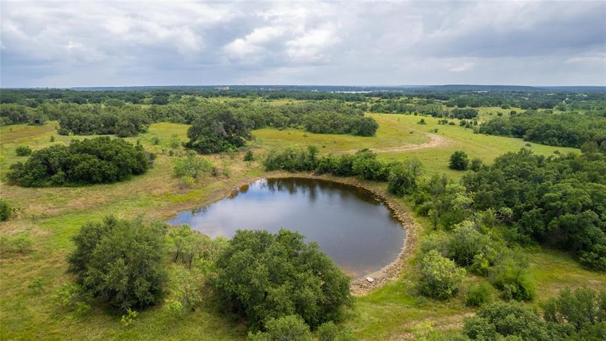 Welcome to a beautiful 340 +- acre property in the heart of Texas! Located 17 miles from Brownwood, easy access is ensured with paved road frontage and four separate gated entries to the property. Fenced and cross-fenced, the landscape is covered with native grasses and a variety of oak, cedar, and mesquite trees. Elevation changes offer spectacular views of the surrounding area, including views of Lake Brownwood, and offer a great setting for potential homesites in multiple locations with electricity and rural water available. Four tanks on the property offer the potential for fishing and water for livestock. The ranch offers excellent recreational and hunting opportunities. Contact us today for a personal showing and unlock the full potential of this tranquil property near Lake Brownwood!