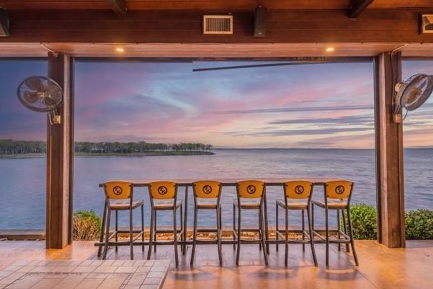 The best waterfront on the lake! TWO lots! Three build sites on four acres!!! Gated, treed, and no HOA with private ramp to beach to allow work on seawall or ripwrap retaining walls that are already permitted with the USACE and installed!