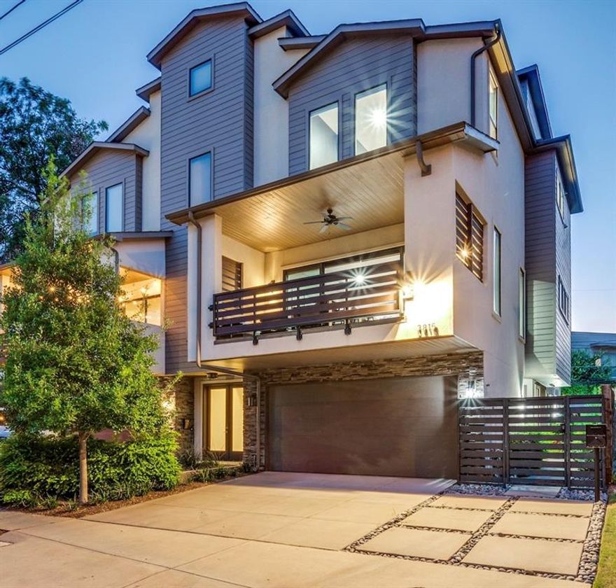 Sleek and sophisticated, this rare no-HOA duplex is ideally located in the highly sought-after Oak Lawn area, just south of Highland Park and minutes from West Village, Travis Walk, and the Katy Trail. Privately tucked behind a gated entrance, this home combines modern design, abundant natural light, and a floor plan tailored for both entertaining and everyday comfort. Inside, hardwood floors and high ceilings create an inviting backdrop for the open living and dining area. The designer kitchen features granite countertops, stainless steel appliances, a large walk-in pantry, and opens to a dining & living space with a 60-ft sliding glass door leading to a covered patio.

The third-floor primary suite offers a private retreat with a sitting area, city views, spa-like bath with luxurious finishes, and a California walk-in closet with attached utility space. Two additional bedrooms with en-suite baths provide flexibility, including a first-floor guest suite with separate entry, full bath, closet, and kitchenette—ideal for a home office, gym, guest quarters, or even a rental opportunity.

Enjoy outdoor living in the newly landscaped, turfed backyard sanctuary. Updates include: new HVAC, epoxy flooring in 2 car garage, designer lighting, Bosch refrigerator, water softening system, and more. 

Walkable to some of Dallas’s most notable restaurants and shops, this exceptional property offers the perfect blend of modern amenities and urban convenience.