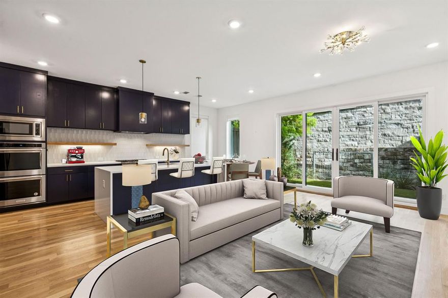 Discover contemporary luxury living at its finest in this architecturally striking 3-bedroom, 2.1-bathroom SFA located at 3959 Bowie Lane in The Reserve at Bluffview, a premier master-planned community located in the heart of Dallas, TX, offering a luxurious and active lifestyle for residents of all ages.  This meticulously designed 2,200 square foot residence showcases clean, modern design inspired by Dutch architecture, offering an exceptional blend of style, functionality, and sophisticated finishes throughout.  This exceptional home stands apart from others with three highly coveted upgrades!  Double ovens, both a luxurious tub and shower, and a private outdoor patio, perfect for dining and entertaining!
The heart of this home features an impressive open-concept living area with soaring ceilings and abundant natural light. The gourmet kitchen boasts custom cabinetry, a large center island with seating, premium countertops, and top-of-the-line stainless steel appliances.  The seamless flow between the kitchen and living areas creates an ideal space for both daily living and entertaining.  The gated community amenities include expansive manicured lawns and green spaces, custom fire pit area with Adirondack seating, and a covered pavilion for outdoor dining and lounging.  3959 Bowie represents an exceptional opportunity to own a piece of contemporary architectural excellence in one of Dallas’s most desirable neighborhoods. Perfect for discerning buyers seeking sophisticated, low-maintenance luxury living with impeccable design, premium finishes, and resort-style community amenities that create a true lifestyle destination.